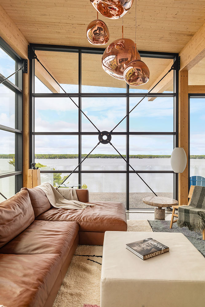 Modern living room with large windows overlooking Falcon Lake