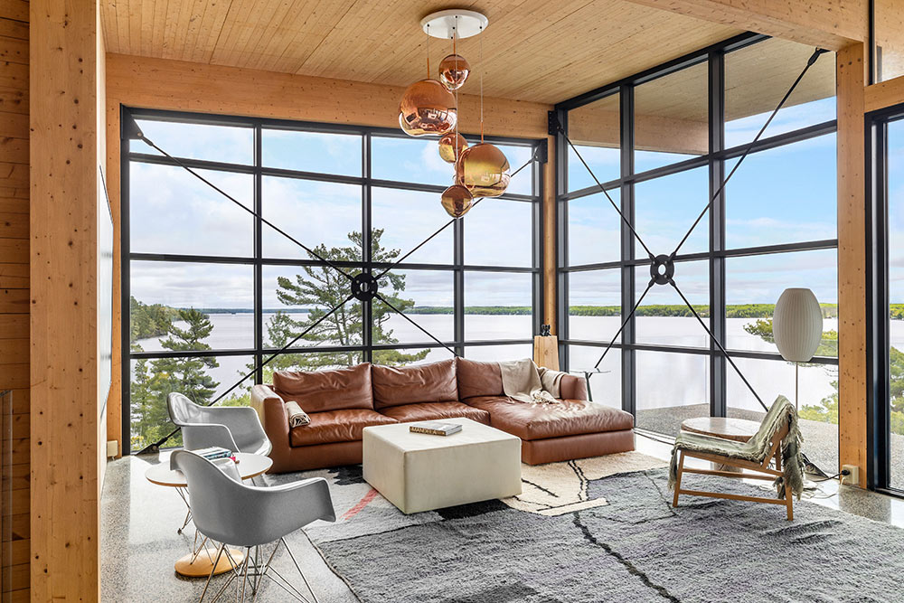 Modern living room with large windows overlooking Falcon Lake